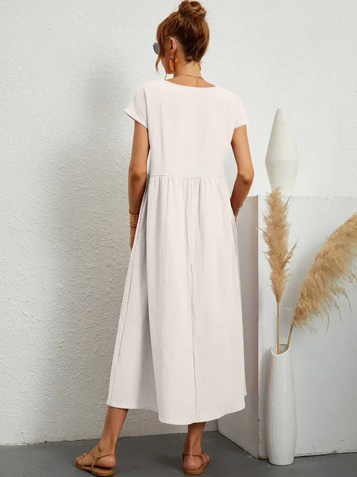 HEIKE | FLOATING MIDI DRESS OF TIMELESS ELEGANCE