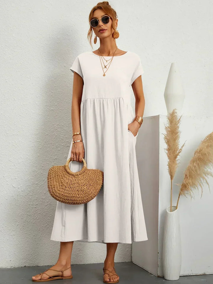 HEIKE | FLOATING MIDI DRESS OF TIMELESS ELEGANCE